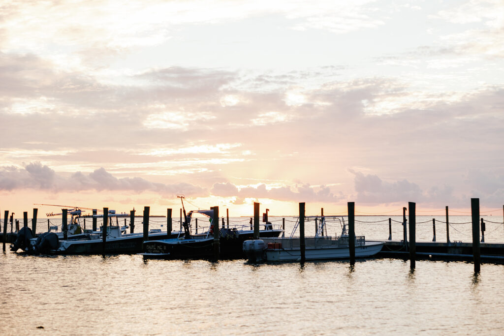 A beautiful snapshot of the sunset at the dock of Bakers Cay Resort